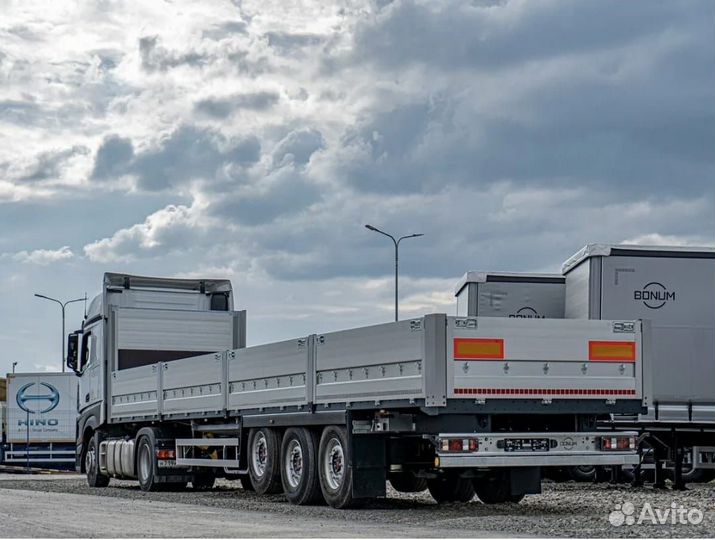 Водитель категории Е на бортовой полуприцеп