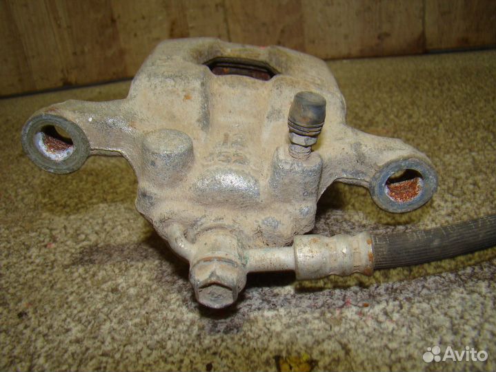 Суппорт задний левый Nissan X-Trail (T31)