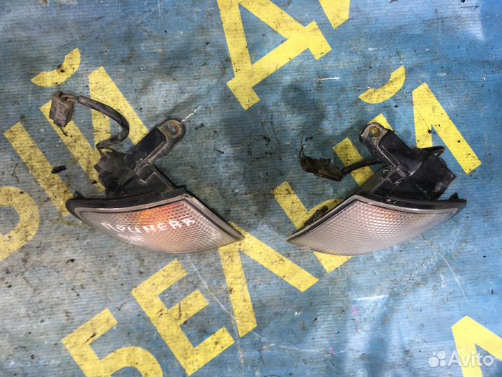 Подфарник Nissan Primera P10