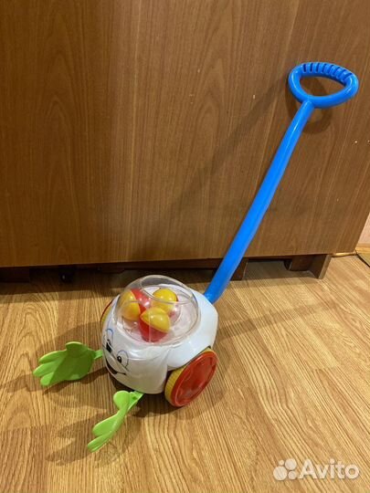 Игрушка каталка с ручкой