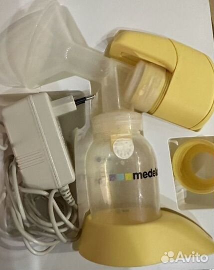 Молокоотсос medela электрический