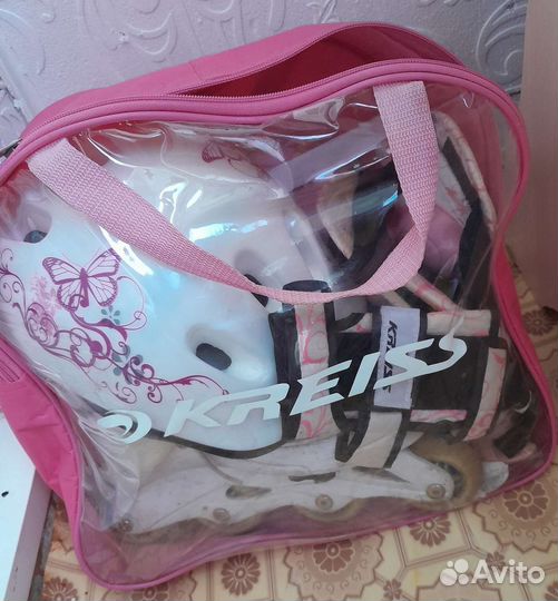 Роликовые коньки