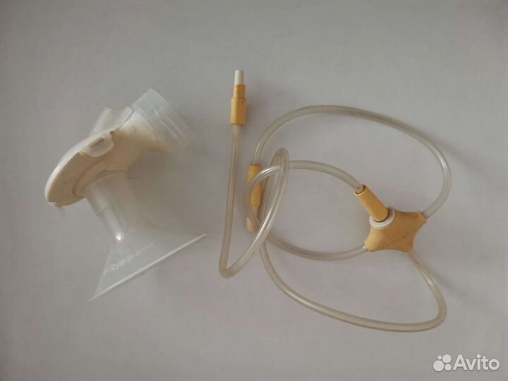 Молокоотсос medela электрический