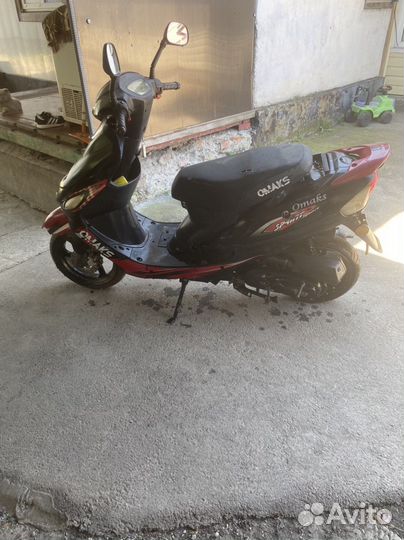 Скутер омакс