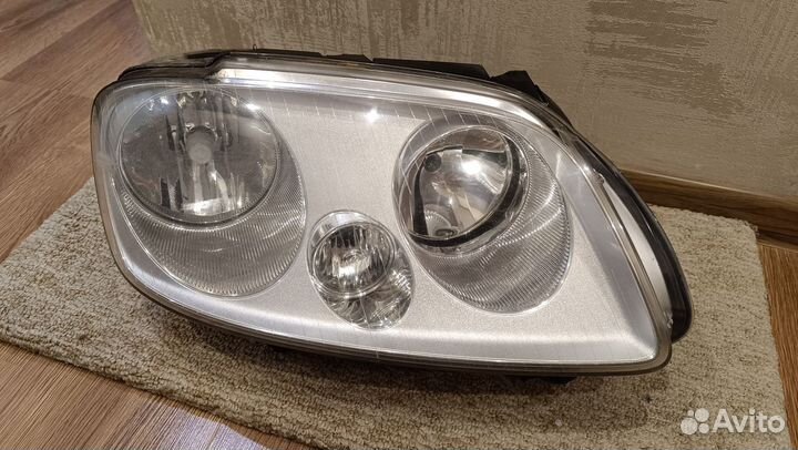 Фара Volkswagen Caddy/Touran