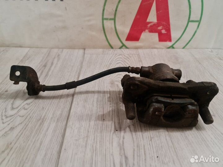 Суппорт задний правый Mitsubishi Lancer 10 CX3A