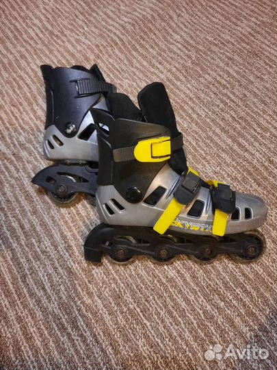 Роликовые коньки