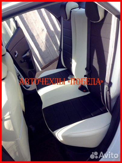 Чехлы Kia Rio 3 седан из экокожи бело-чёрные Класс