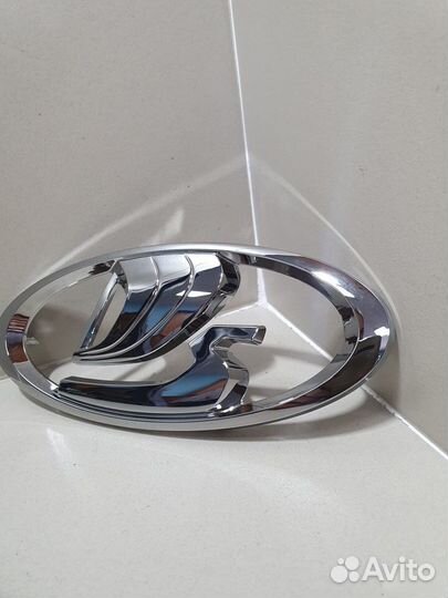 Эмблема передняя Niva Travel хром