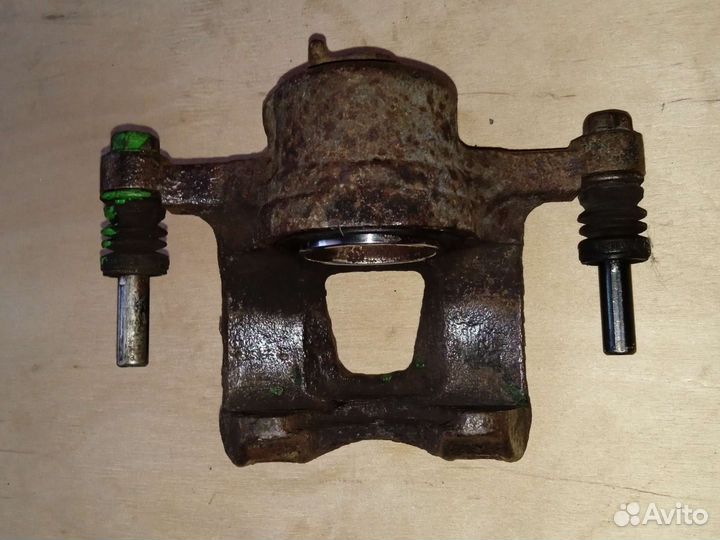 Тормозной суппорт передний левый Daewoo Matiz 0,8