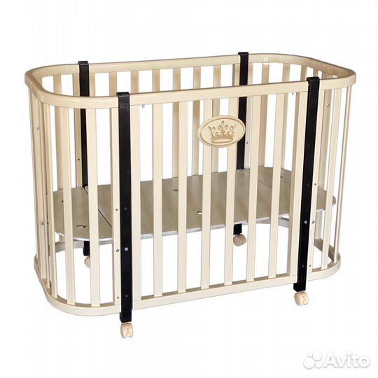 Детская кроватка с маятником