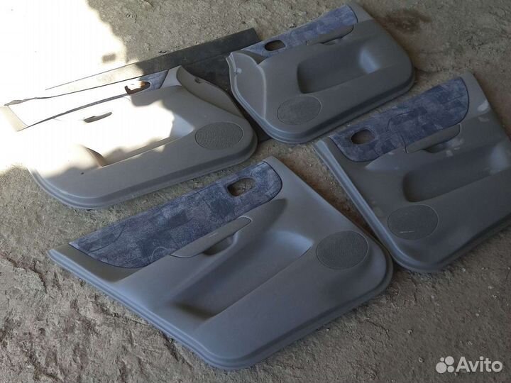 Обшивки карты дверей Mazda Premacy