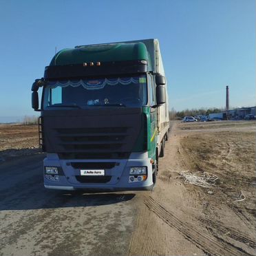 Тентованный грузовик 100 м³ IVECO Stralis, 2012