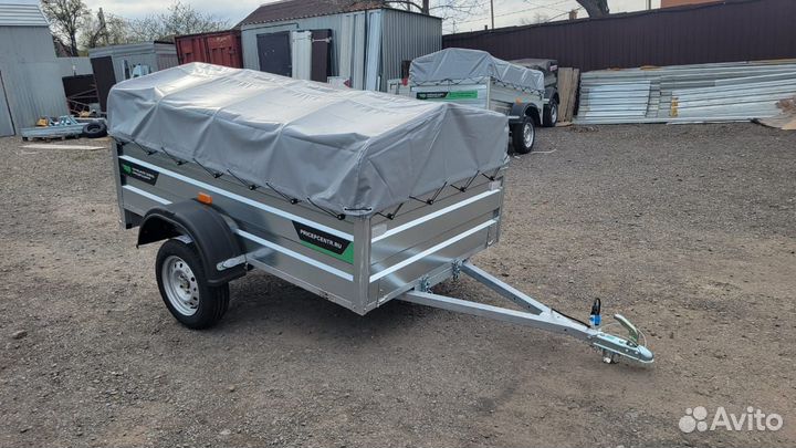 Легковой прицеп 2.2 х 1.3 борт 52см с тентом
