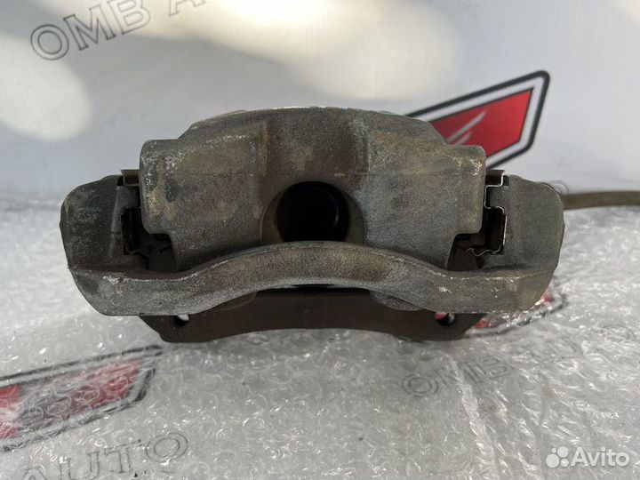 Суппорт тормозной передний левый Шевроле Круз