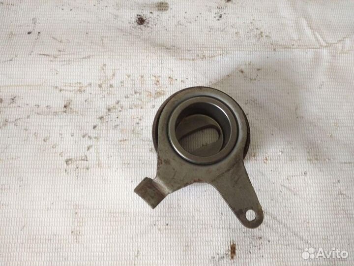 Ролик-натяжитель грм Kia Shuma