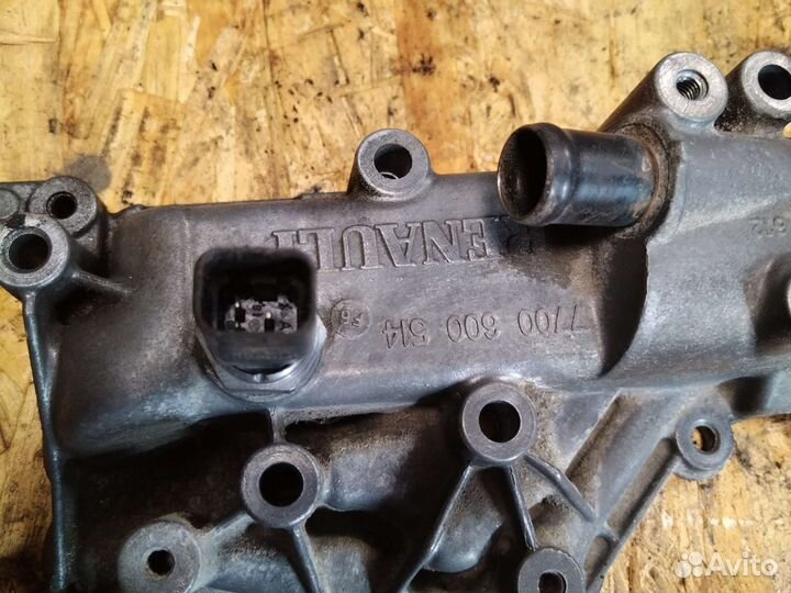 Корпус термостата Renault Logan 1 K4M