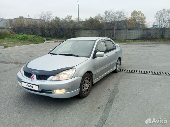 Mitsubishi Lancer 1.6 МТ, 2006, 306 000 км