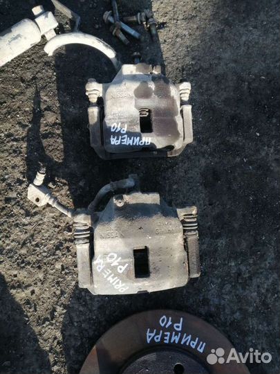 Суппорт передний ниссан примера p10