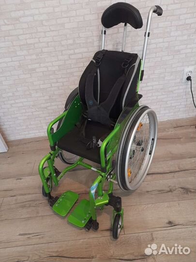 Детская инвалидная коляска