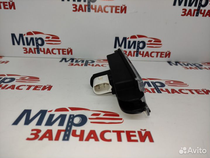 Фонарь освещения номерного знака Renault Logan