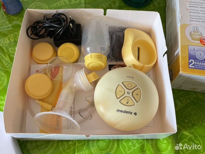 Молокоотсос medela swing