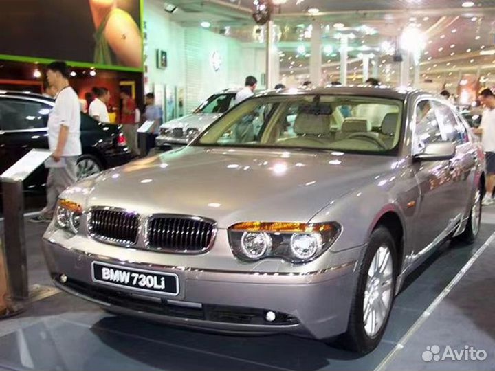 Стекло левой фары BMW 7 E65 E66 2001-2005