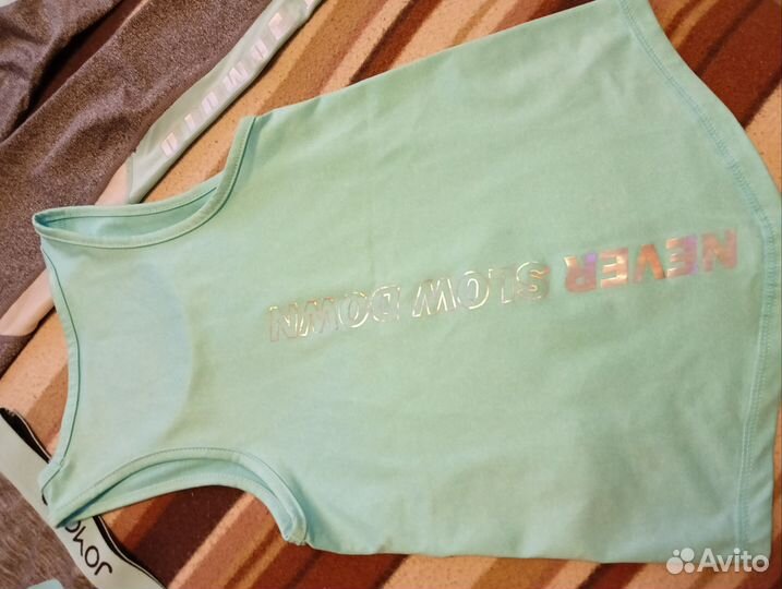 Спортивные вещи для девочки 128 134