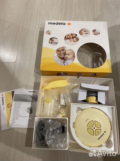 Молокоотсос medela электрический