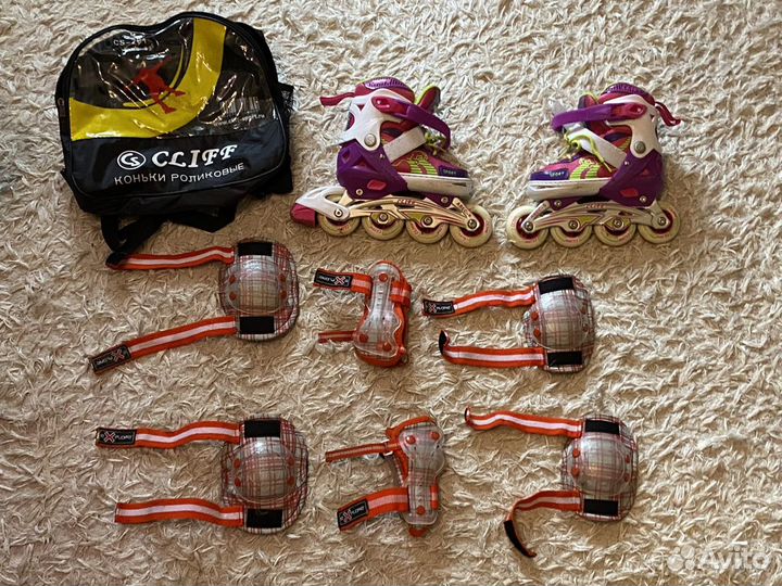 Роликовые коньки
