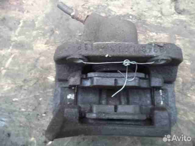 Суппорт передний левый Renault Sandero 1