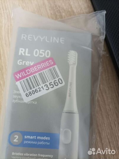 Электрическая зубная щетка