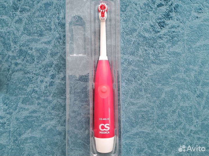 Электрическая зубная щетка