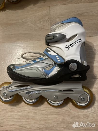 Роликовые коньки