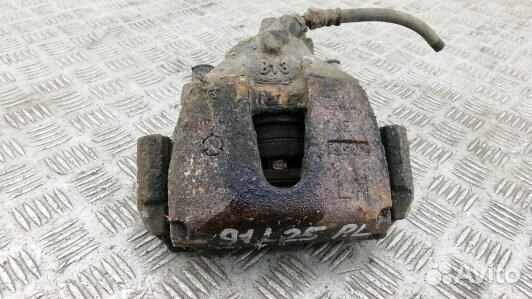 Суппорт тормозной передний левый mazda 3 2 (91L25K