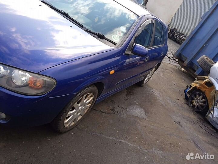 Стойка передняя левая nissan almera N16 2004