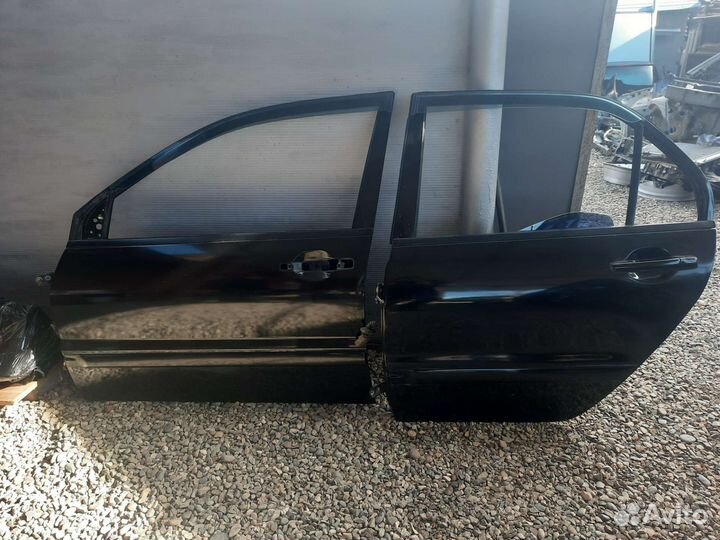 Двери mitsubishi lancer 9
