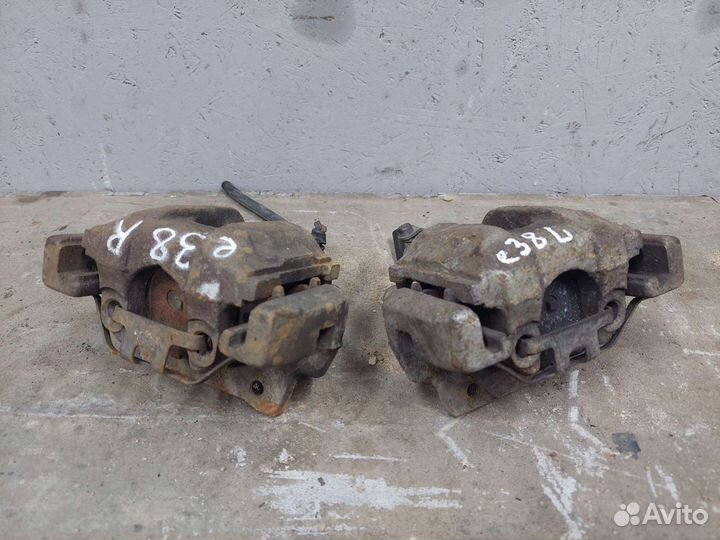 Супорт задний бмв е38