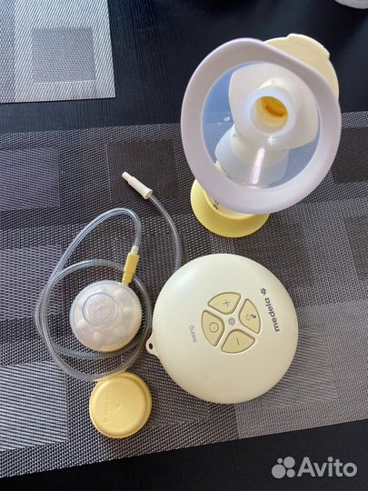 Молокоотсос medela swing flex электрический