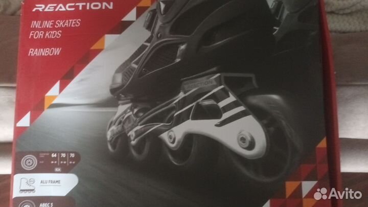 Роликовые коньки