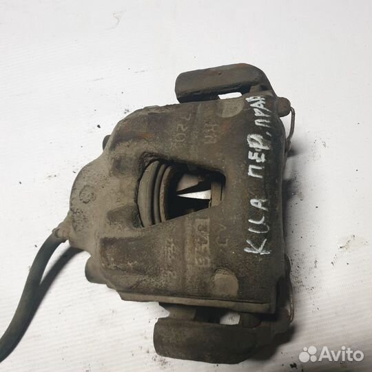 Суппорт передний правый kia clarus