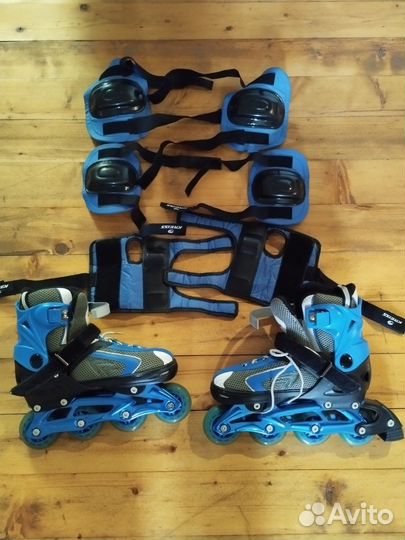 Роликовые коньки