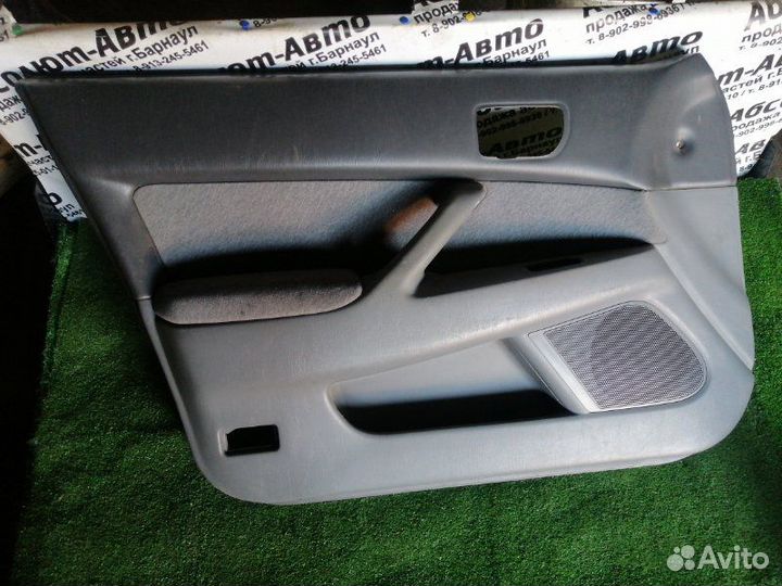 Обшивка двери передняя левая Toyota Vista SV40