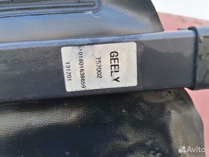 Шторка багажника Geely Emgrand X7