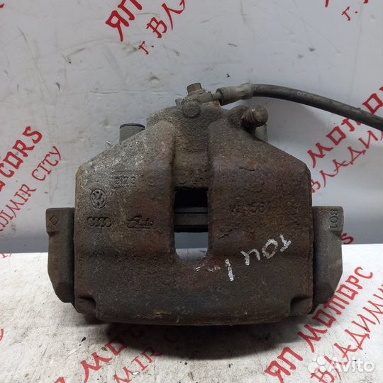 Суппорт тормозной передний левый Volkswagen Touran