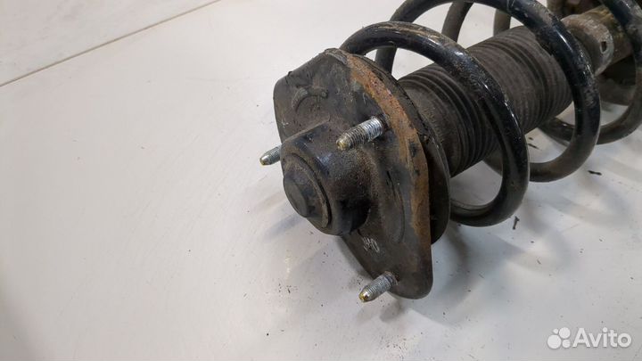 Амортизатор подвески левый передний SsangYong Korando 2010