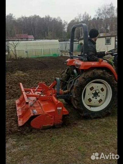 Вспашка земли японским минитрактором