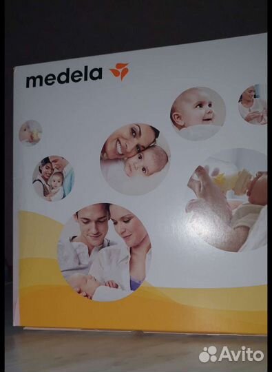 Молокоотсос medela электрический