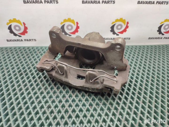 Суппорт тормозной передний правый Volkswagen