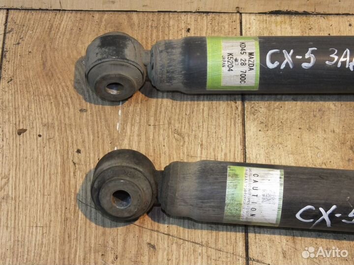 Стойка амортизатора задняя Mazda CX-5. Мазда сх5